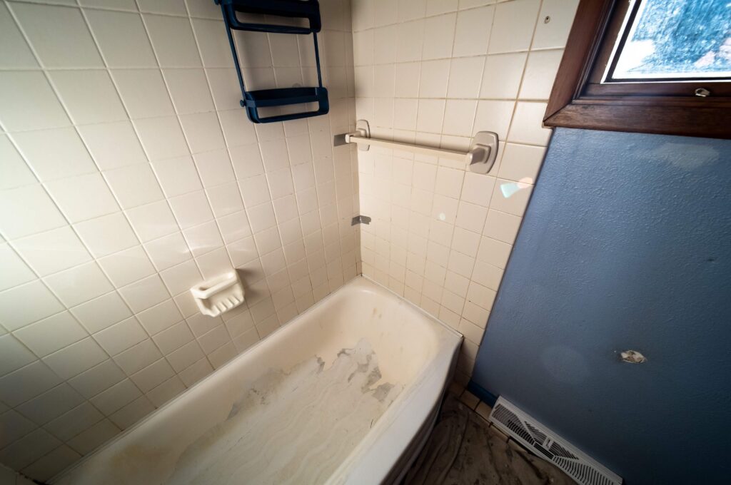 Old damaged bathtub